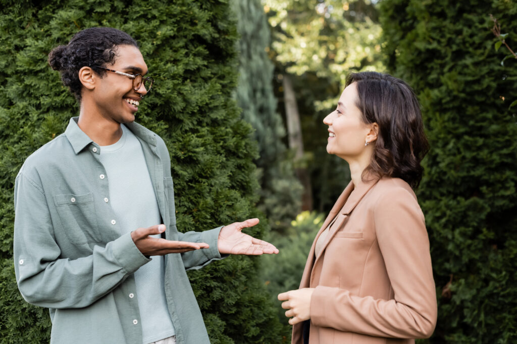 Sales professional using closing technique in sales to a customer.